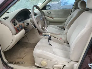 2000 Mazda 626 LX with VIN 1YVGF22D8Y5126950, listed as a Copart auction lot 69440124 with 208,584 mi miles and Salvage Title. Bid and sale history available at carsss.com. Image 7.