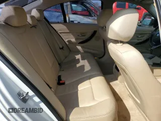 2013 BMW 3 Series 320i xDrive with VIN WBA3C3C5XDF980169, listed as a Copart auction lot 52717675 with 119,297 mi miles and Salvage title. Bid and sale history available at DreamBid. Image 10.