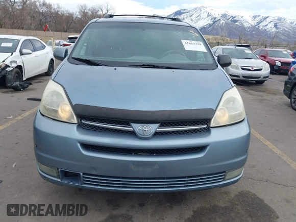 2005 Toyota Sienna XLE with VIN 5TDBA22CX5S039921, listed as a IAAI auction lot 41812339 with 245,111 mi miles and . Bid and sale history available at DreamBid. Image 12.