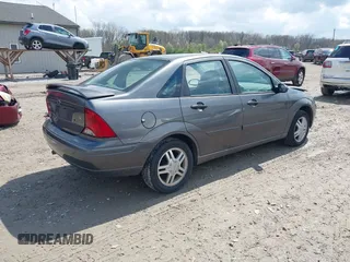2004 Ford Focus SE with VIN 1FAFP34334W177338, listed as a IAAI auction lot 42003202 with 190,581 mi miles and . Bid and sale history available at DreamBid. Image 4.