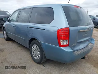 2011 Kia Sedona LX with VIN KNDMG4C70B6424016, listed as a IAAI auction lot 41964190 with 116,859 mi miles. Bid and sale history available at carsss.com. Image 3.