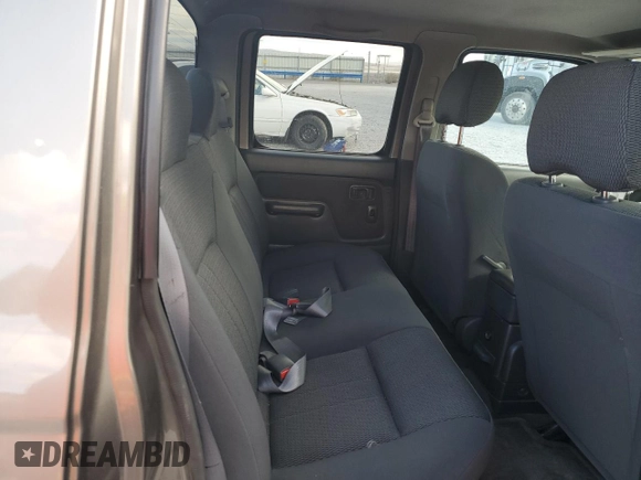 2003 Nissan Frontier XE with VIN 1N6ED27T73C433384, listed as a Copart auction lot 80153654 with 248,803 mi miles and Salvage title. Bid and sale history available at DreamBid. Image 11.