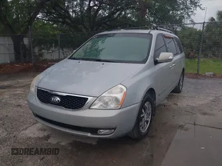 2014 Kia Sedona EX with VIN KNDMH4C74E6578326, listed as a IAAI auction lot 41990311 with 220,772 mi miles. Bid and sale history available at carsss.com. Image 2.