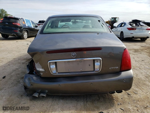 2001 Cadillac DeVille DTS with VIN 1G6KF57961U249148, listed as a Copart auction lot 73604474 with NaN miles and Salvage Title. Bid and sale history available at carsss.com. Image 6.