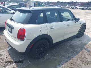 2020 MINI Hardtop 4 Door Cooper with VIN WMWXU7C01L2M54710, listed as a IAAI auction lot 42385956 with 55,714 mi miles and . Bid and sale history available at DreamBid. Image 4.