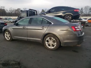 2015 Ford Taurus SEL with VIN 1FAHP2H81FG172404, listed as a Copart auction lot 85372414 with 146,894 mi miles and Salvage Title. Bid and sale history available at carsss.com. Image 2.