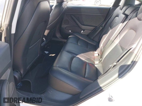 2023 Tesla Model 3 Long Range with VIN 5YJ3E1EBXPF392818, listed as a IAAI auction lot 41346835 with 31,750 mi miles and . Bid and sale history available at DreamBid. Image 8.
