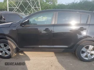2013 Kia Sportage LX z VIN KNDPBCA27D7451269, wystawiony jako IAAI lot #42399187 z przebiegiem 119 507 mil mil oraz . Historia ofert i sprzedaży dostępna na DreamBid. Obrazek 14.