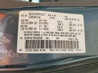 2005 Dodge Caravan SXT with VIN 2D4GP44L75R335536, listed as a Copart auction lot 60933985 with 212,231 mi miles and Salvage title. Bid and sale history available at DreamBid. Image 13.