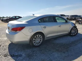 2013 Buick LaCrosse Leather с VIN 1G4GC5E35DF265047, выставлен на аукционе Copart как лот 55631635 с пробегом 103 520 миль миль и Списание • Salvage title. История ставок и продаж доступна на DreamBid. Изображение 3.