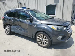 2018 Ford Escape Titanium with VIN 1FMCU0J93JUB20136, listed as a Copart auction lot 56841065 with 129,954 mi miles and Salvage title. Bid and sale history available at DreamBid. Image 4.