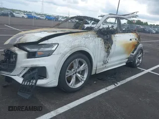 2022 Audi Q8 Premium Plus with VIN WA1BVBF15ND021085, listed as a IAAI auction lot 42214667 with Not provided miles and . Bid and sale history available at DreamBid. Image 16.