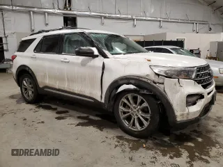 2021 Ford Explorer XLT with VIN 1FMSK8DH8MGA25562, listed as a Copart auction lot 42580855 with 35,462 mi miles and Salvage Title. Bid and sale history available at carsss.com. Image 4.