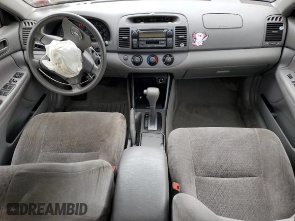 2004 Toyota Camry LE z VIN JTDBE32KX40273821, wystawiony jako Copart lot #58938275 z przebiegiem 153 096 mil mil oraz Szkoda całkowita • Salvage title. Historia ofert i sprzedaży dostępna na DreamBid. Obrazek 8.
