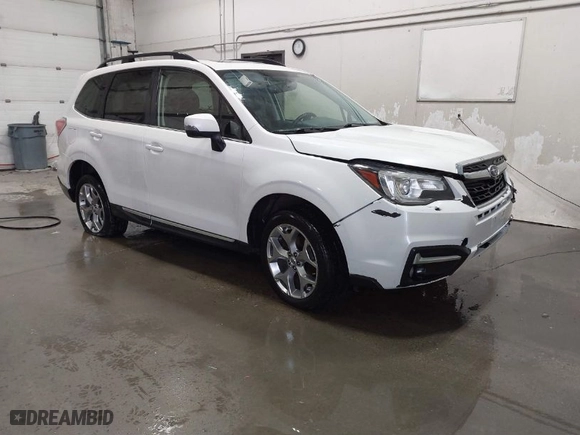 2018 Subaru Forester Touring with VIN JF2SJAWC8JH463943, listed as a IAAI auction lot 41611230 with 65,444 mi miles. Bid and sale history available at carsss.com. Image 1.