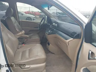 2005 Honda Odyssey EX-L with VIN 5FNRL38705B085917, listed as a IAAI auction lot 42210776 with 296,056 mi miles. Bid and sale history available at carsss.com. Image 5.