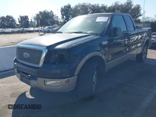 2004 Ford F-150 XL with VIN 1FTPX125X4NB03038, listed as a IAAI auction lot 41555454 with 218,770 mi miles. Bid and sale history available at carsss.com. Image 2.