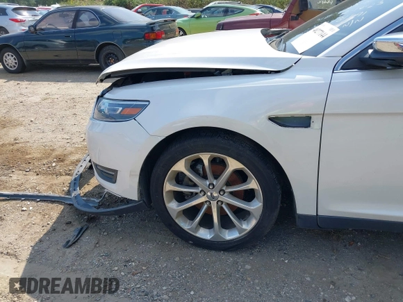2014 Ford Taurus Limited with VIN 1FAHP2F8XEG181491, listed as a IAAI auction lot 40277144 with 107,374 mi miles. Bid and sale history available at carsss.com. Image 14.