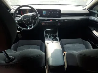 2025 Kia K5 LXS z VIN KNAG24J74S5284568, wystawiony jako Copart lot #58919595 z przebiegiem 10 375 mil mil oraz Szkoda całkowita • Salvage title. Historia ofert i sprzedaży dostępna na DreamBid. Obrazek 8.