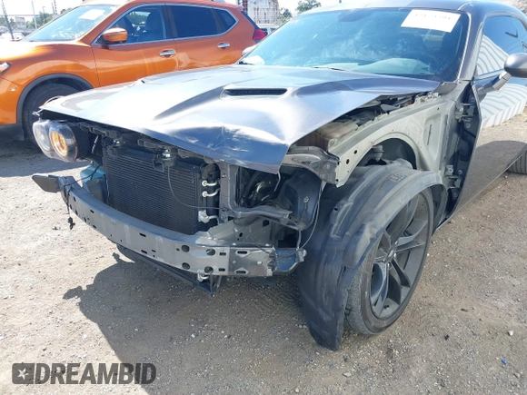 2017 Dodge Challenger R/T Plus with VIN 2C3CDZBT8HH600032, listed as a IAAI auction lot 42173591 with 92,303 mi miles and . Bid and sale history available at DreamBid. Image 6.
