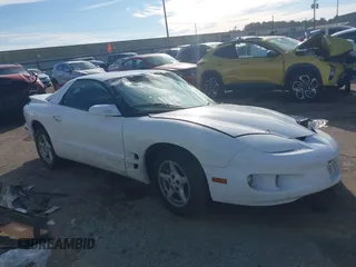 1999 Pontiac Firebird with VIN 2G2FS22K6X2207200, listed as a IAAI auction lot 41346548 with 1 mi miles. Bid and sale history available at carsss.com. Image 1.