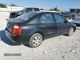 2006 Kia Spectra EX with VIN KNAFE121965264656, listed as a Copart auction lot 69724334 with 101,685 mi miles and Salvage Title. Bid and sale history available at carsss.com. Image 3.