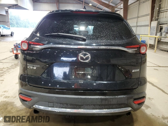 2016 Mazda CX-9 Grand Touring with VIN JM3TCADY2G0104050, listed as a Copart auction lot 56581425 with 100,737 mi miles and Salvage title. Bid and sale history available at DreamBid. Image 6.