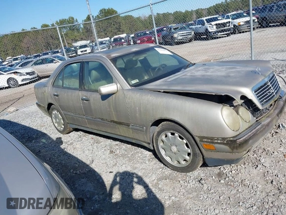 1997 Mercedes-Benz E-Class with VIN WDBJF55F4VA405680, listed as a IAAI auction lot 41462478 with 352,480 mi miles. Bid and sale history available at carsss.com. Image 1.