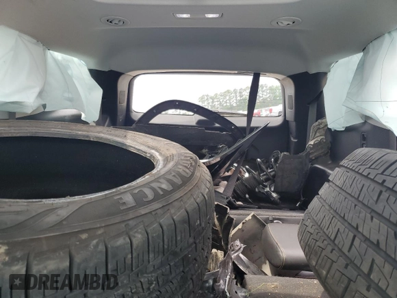 2021 Chevrolet Traverse Premier with VIN 1GNERKKW2MJ262862, listed as a Copart auction lot 58779765 with 76,927 mi miles and Salvage title. Bid and sale history available at DreamBid. Image 10.