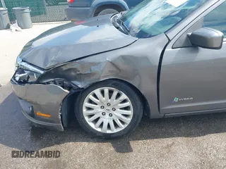 2011 Ford Fusion Hybrid with VIN 3FADP0L32BR132155, listed as a IAAI auction lot 42196233 with 77,900 mi miles and . Bid and sale history available at DreamBid. Image 6.