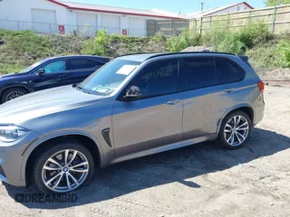 2014 BMW X5 xDrive50i with VIN 5UXKR6C57E0J72301, listed as a IAAI auction lot 39379887 with 117,012 mi miles. Bid and sale history available at carsss.com. Image 6.