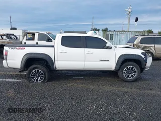 2021 Toyota Tacoma SR z VIN 3TMCZ5AN2MM426723, wystawiony jako IAAI lot #41604033 z przebiegiem 46 522 mil mil oraz . Historia ofert i sprzedaży dostępna na DreamBid. Obrazek 14.