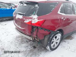 2021 Chevrolet Equinox Premier z VIN 2GNAXXEV4M6105996, wystawiony jako IAAI lot #41402065 z przebiegiem 51 083 mil mil oraz . Historia ofert i sprzedaży dostępna na DreamBid. Obrazek 18.