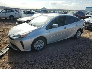 2019 Toyota Prius L Eco z VIN JTDKARFU7K3087904, wystawiony jako Copart lot #51280525 z przebiegiem 161 520 mil mil oraz Szkoda całkowita • Salvage title. Historia ofert i sprzedaży dostępna na DreamBid. Obrazek 1.