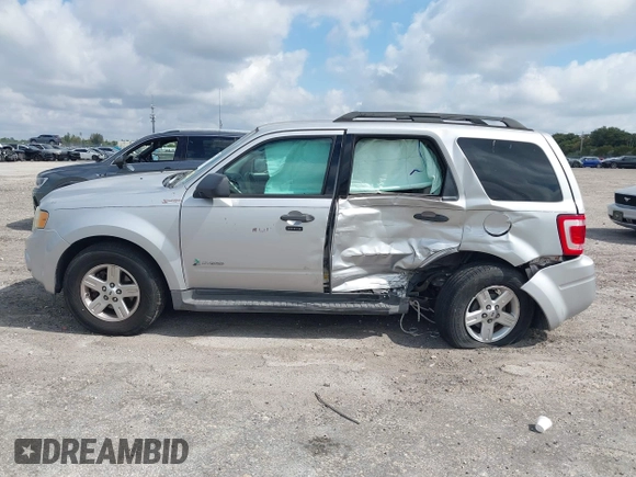 2011 Ford Escape Hybrid with VIN 1FMCU4K3XBKC60103, listed as a IAAI auction lot 42048614 with 125,354 mi miles and . Bid and sale history available at DreamBid. Image 14.