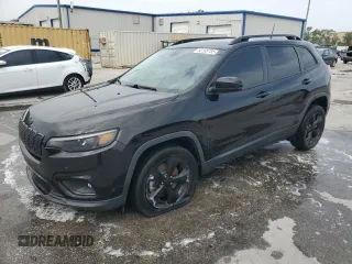 2020 Jeep Cherokee Altitude with VIN 1C4PJLLB4LD592817, listed as a Copart auction lot 58168785 with 57,400 mi miles and Salvage title. Bid and sale history available at DreamBid. Image 1.