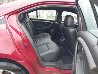 2014 Ford Taurus SEL with VIN 1FAHP2E87EG121203, listed as a IAAI auction lot 41908069 with 140,451 mi miles. Bid and sale history available at carsss.com. Image 8.