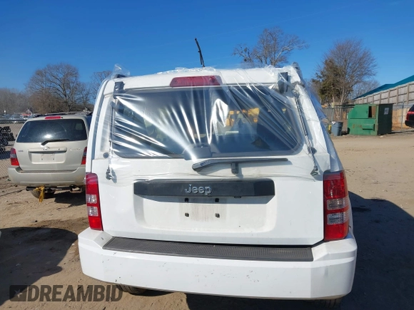 2012 Jeep Liberty Sport with VIN 1C4PJLAK7CW213834, listed as a IAAI auction lot 41353723 with 220,371 mi miles and . Bid and sale history available at DreamBid. Image 12.