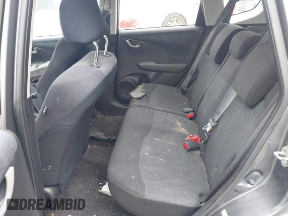 2011 Honda Fit Sport z VIN JHMGE8H53BS004872, wystawiony jako IAAI lot #42290323 z przebiegiem 145 685 mil mil oraz . Historia ofert i sprzedaży dostępna na DreamBid. Obrazek 8.