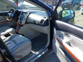 2004 Lexus RX 330 with VIN 2T2HA31U74C004475, listed as a IAAI auction lot 41910886 with 236,085 mi miles. Bid and sale history available at carsss.com. Image 5.