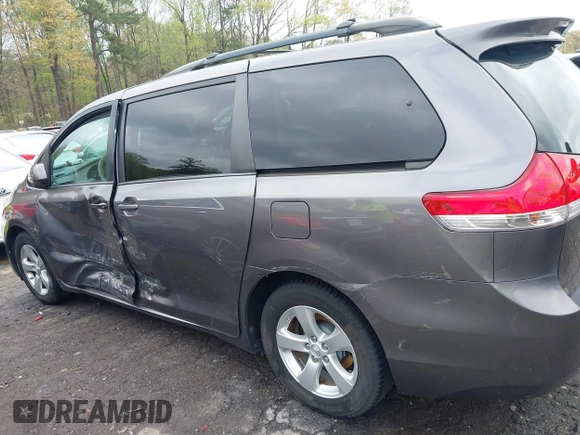 2014 Toyota Sienna LE AAS with VIN 5TDKK3DC3ES506466, listed as a IAAI auction lot 41908023 with 118,297 mi miles and . Bid and sale history available at carsss.com. Image 6.