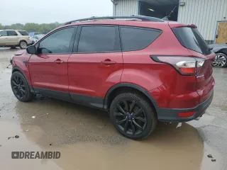 2018 Ford Escape SE z VIN 1FMCU9GD4JUA49819, wystawiony jako Copart lot #73023734 z przebiegiem 96 228 mil mil oraz Szkody całkowita. Historia ofert i sprzedaży dostępna na DreamBid. Obrazek 2.