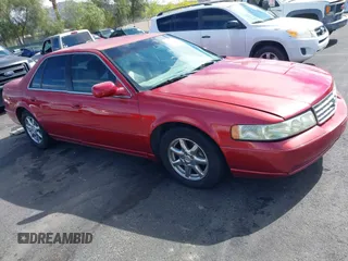 2002 Cadillac Seville Luxury SLS z VIN 1G6KS54Y52U166237, wystawiony jako IAAI lot #42118088 z przebiegiem 130 664 mil mil oraz . Historia ofert i sprzedaży dostępna na DreamBid. Obrazek 1.