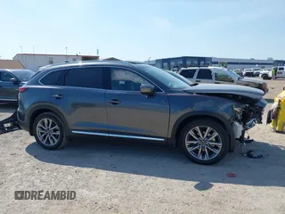 2020 Mazda CX-9 Grand Touring z VIN JM3TCADY8L0417775, wystawiony jako IAAI lot #42306864 z przebiegiem 35 287 mil mil oraz . Historia ofert i sprzedaży dostępna na DreamBid. Obrazek 14.