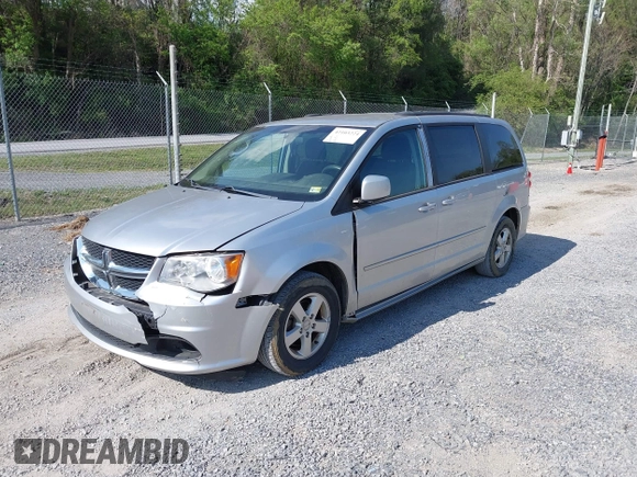 2012 Dodge Grand Caravan SXT with VIN 2C4RDGCG0CR284124, listed as a IAAI auction lot 42103224 with 131,691 mi miles and . Bid and sale history available at DreamBid. Image 21.