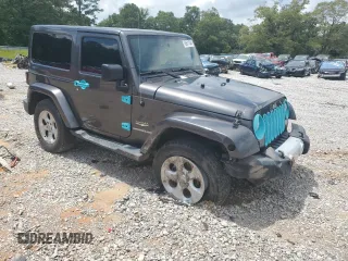 2014 Jeep Wrangler Sahara with VIN 1C4AJWBG8EL248291, listed as a Copart auction lot 60611345 with 84,777 mi miles and Salvage title. Bid and sale history available at DreamBid. Image 4.