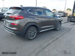2020 Hyundai Tucson Sport with VIN KM8J33AL1LU128648, listed as a IAAI auction lot 41476040 with 66,526 mi miles. Bid and sale history available at carsss.com. Image 4.