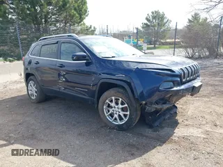 2015 Jeep Cherokee Latitude z VIN 1C4PJMCSXFW558296, wystawiony jako IAAI lot #42113499 z przebiegiem 120 476 mil mil oraz . Historia ofert i sprzedaży dostępna na DreamBid. Obrazek 1.