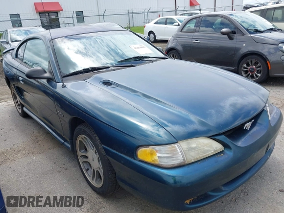 1996 Ford Mustang GT z VIN 1FALP42XXTF137304, wystawiony jako IAAI lot #42464808 z przebiegiem 166 565 mil mil oraz . Historia ofert i sprzedaży dostępna na DreamBid. Obrazek 16.