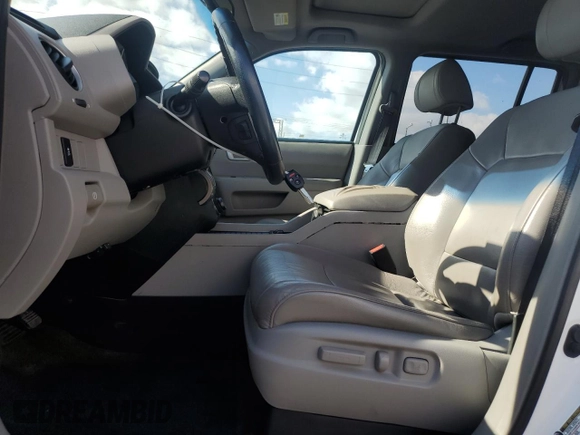 2014 Honda Pilot EX-L with VIN 5FNYF3H77EB018900, listed as a Copart auction lot 85947924 with 74,842 mi miles and Salvage Title. Bid and sale history available at DreamBid. Image 7.